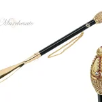 Lugë Këpucësh - il Marchesato e veshur me ar 24K